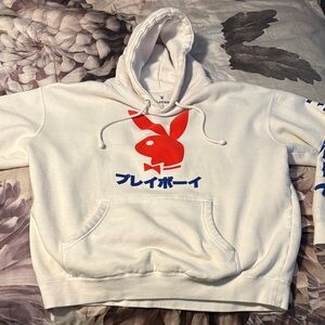 White Hoodie with Blue Japanese Text. Sleeves have some darkening but nothing ba